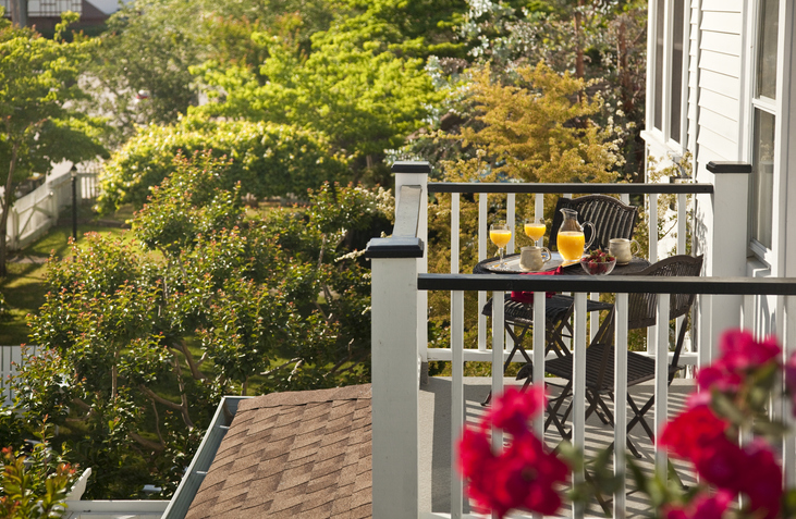 Breakfast served on a table overlooking gardens