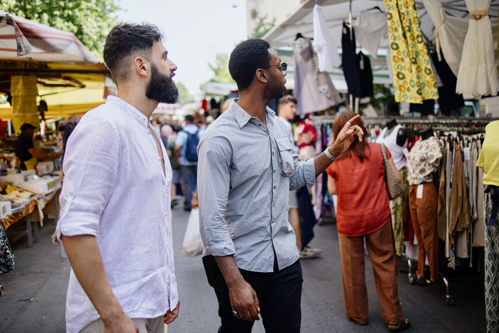 Friends exploring flea market