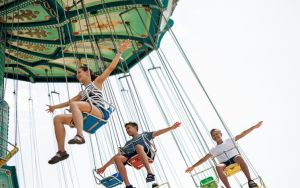 Kids enjoying chair swing ride
