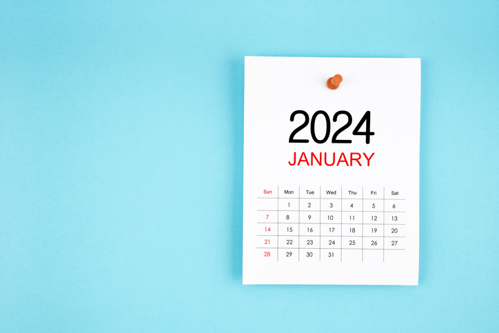 January 2024 calendar page with push pin on blue background.