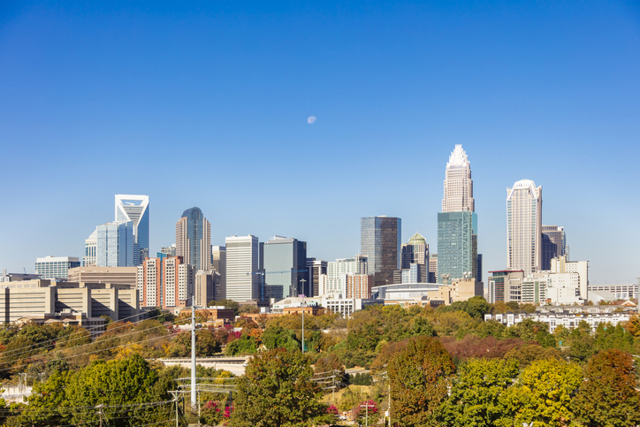 Charlotte North Carolina under a daytime moon