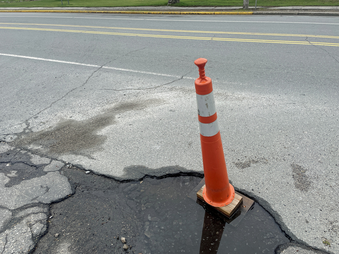 Pot hole in roadway