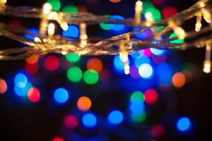 Defocused Image Of Illuminated Christmas Lights
